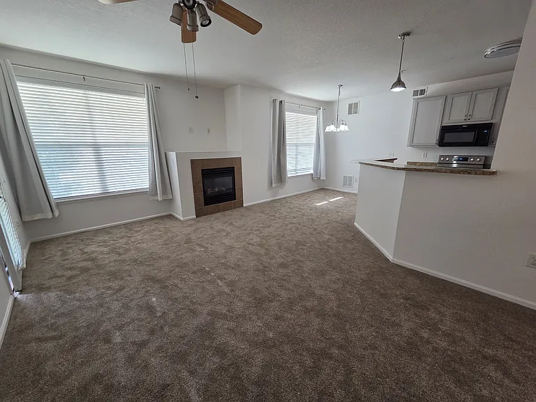 Living Room, dining area and kitchen view from the condo entrance