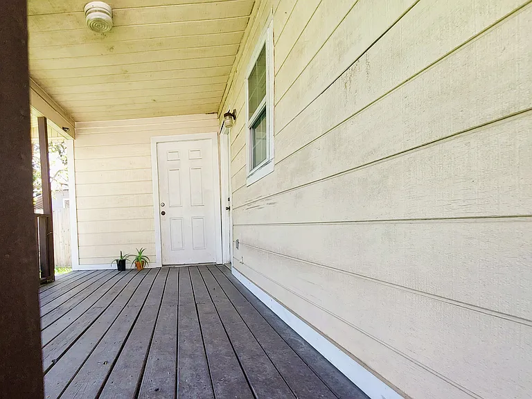 Good size deck for a sectional sofa and table & chair.