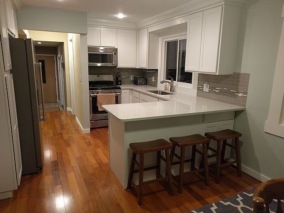 renovated kitchen with bar