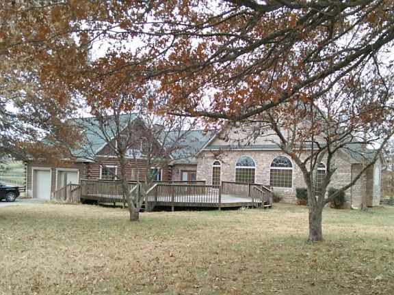 View of rear building adjoining Log Cabin