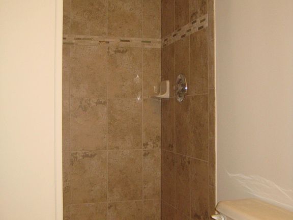 DESIGNER TILE ALL 3 BATHS