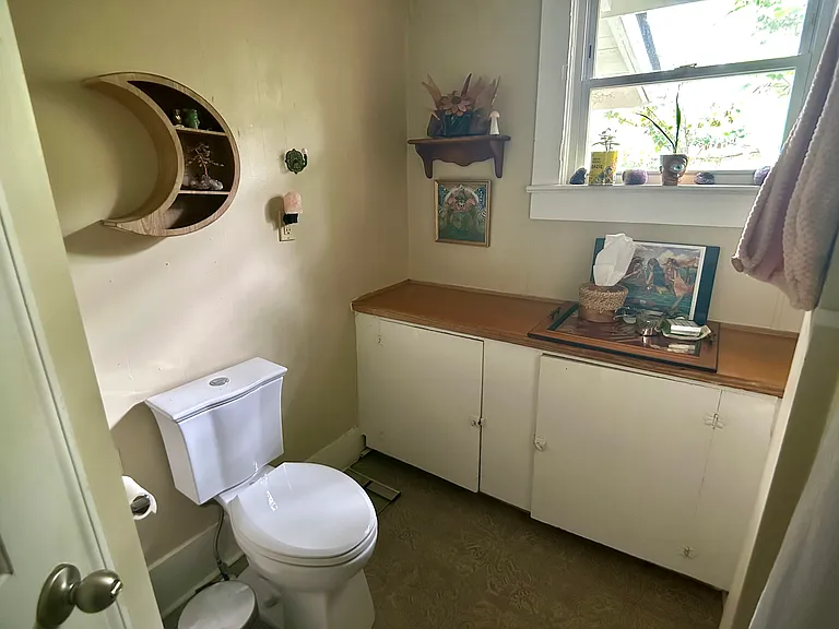 bathroom with brand new toilet
