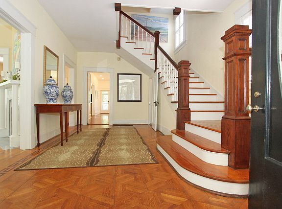 Gracious entry. Period architectural details. Parquet floor.