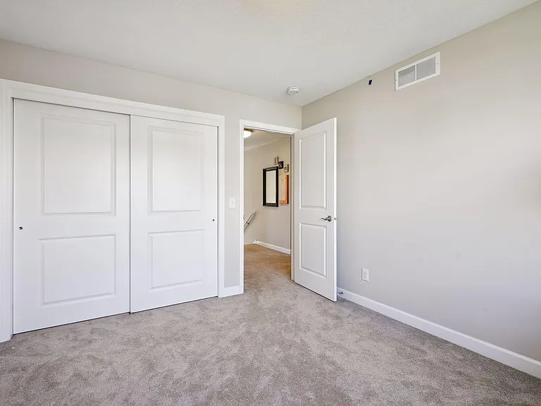 sliding door closet in the fourth bedroom