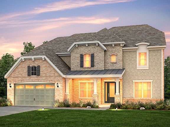 Worthington Exterior 6 features brick, stone, shakes and covered front porch