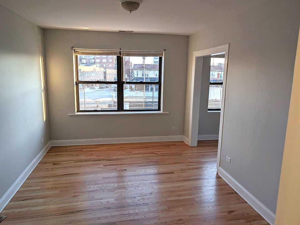 living room (opening into den to right)