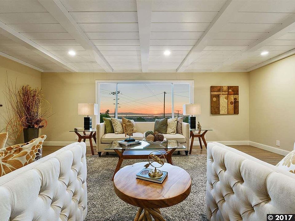Living room with sunset views of the bay.