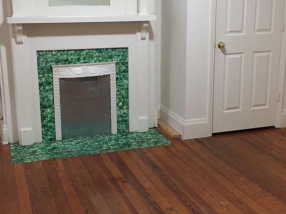 Nice hardwood floors in bedrooms, beautiful mantle and a covered porch off bedroom for relaxing!