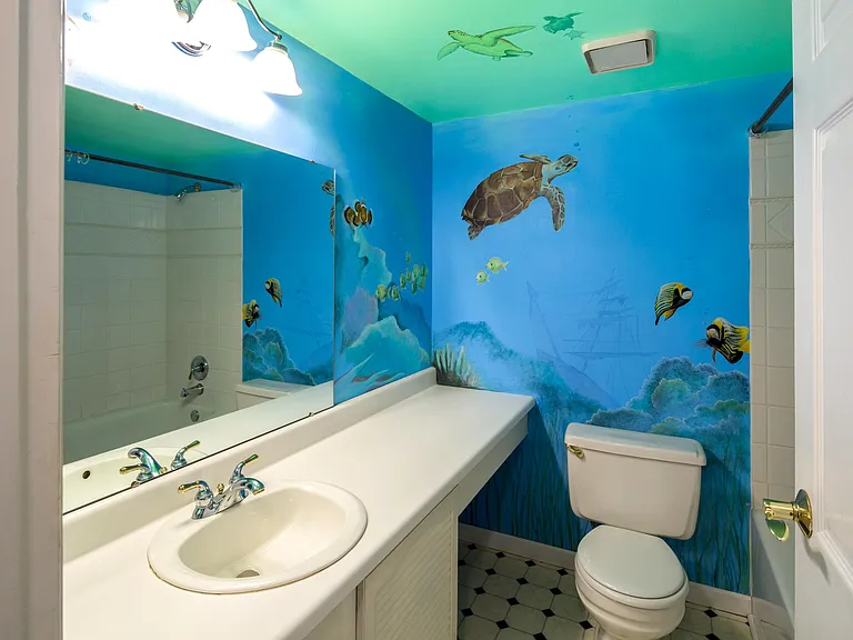 Professionally painted undersea mural in second full bath!