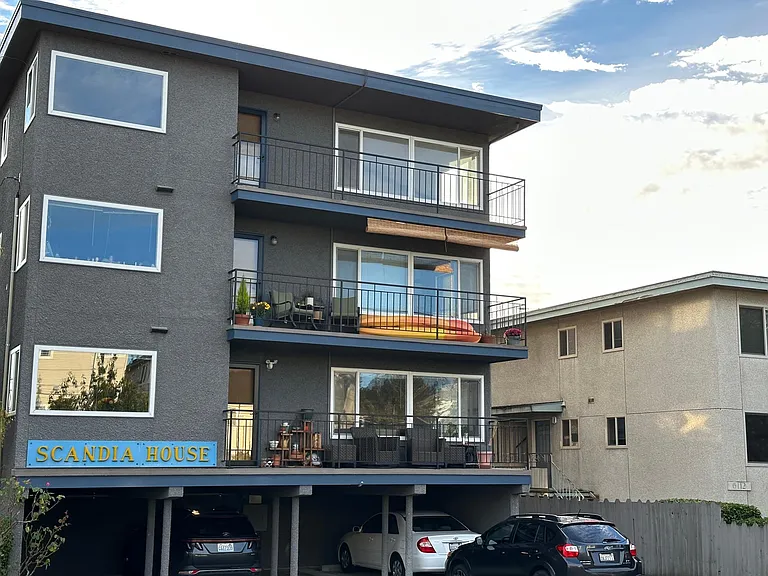 Top floor unit. Covered carport parking is the spot to the north or left.