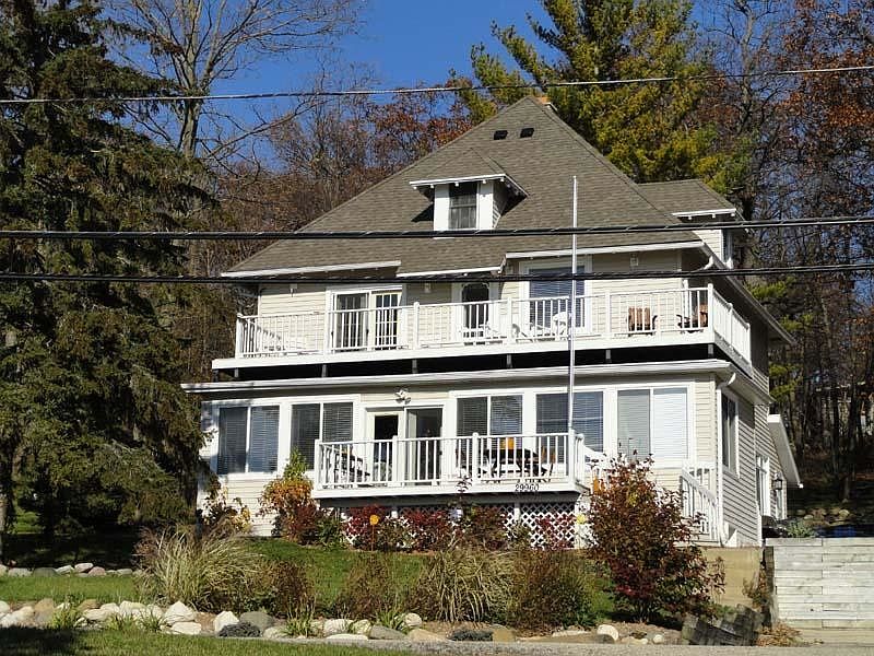 Sunny Home facing Pewaukee Lake