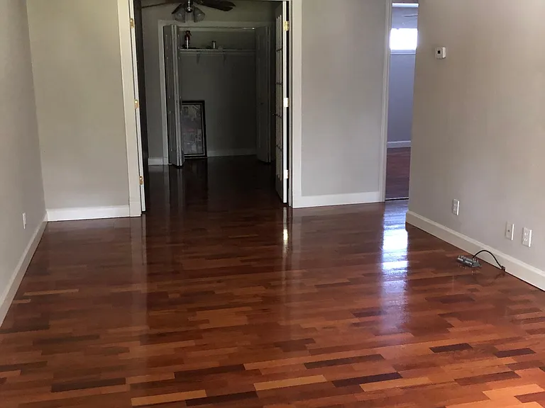 Entry to second bedroom and back door access to parking area.