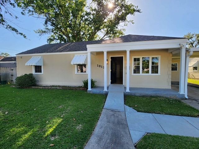 Front of the home with carport