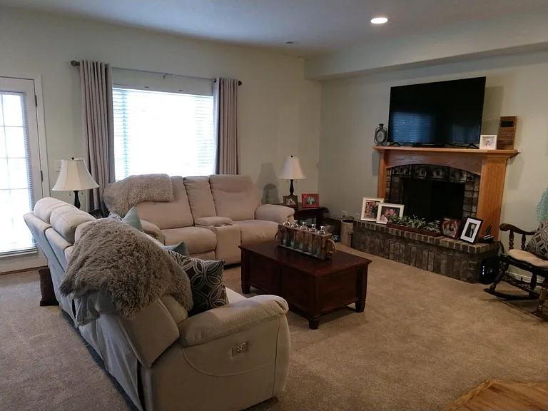 Family room with fireplace.