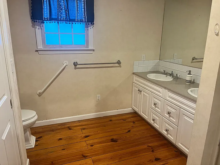 main level bathroom between master and kitchen