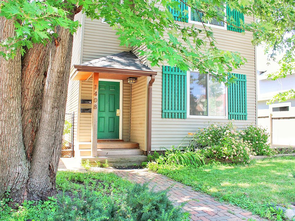 Shaded front yard with mature tree