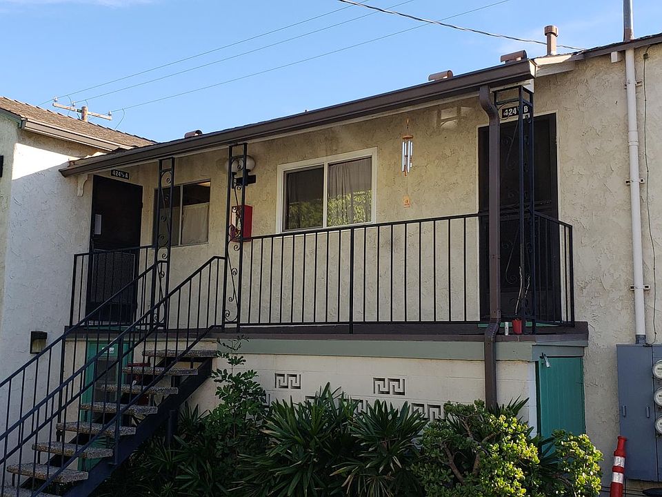 This apt is on the second level and the front door is on the right