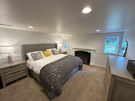 Downstairs master with gas fireplace and closet (not shown).