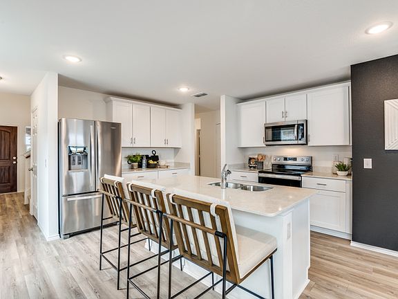 Entry into spacious kitchen