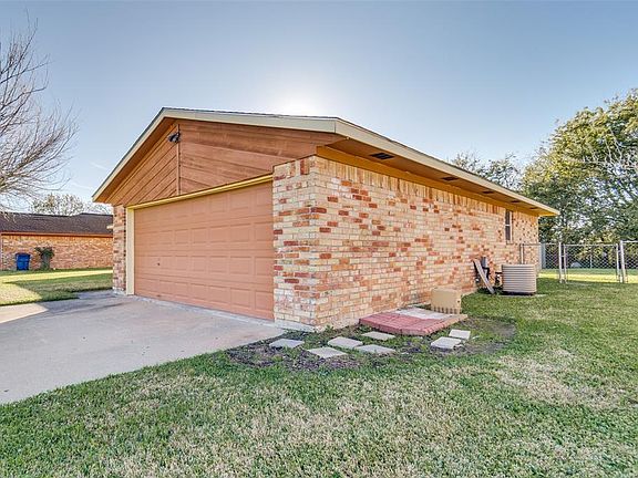 Attached Garage. Enough space for 2 vehicles. Also houses your washer/Dryer.