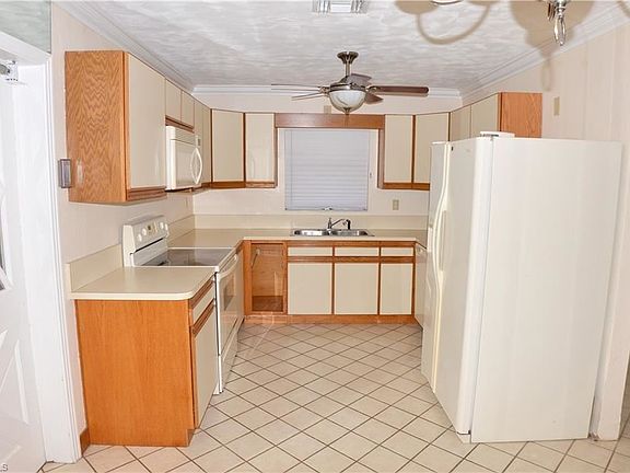 4th image of 6231 Saint Andrews Cir N