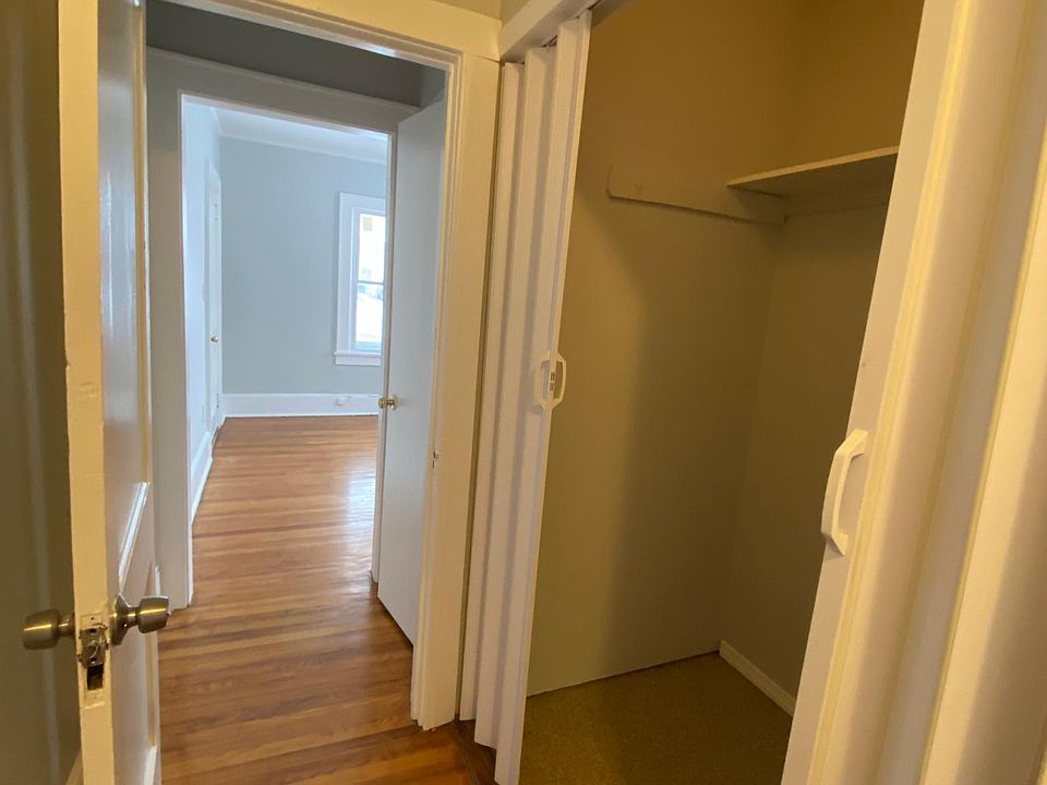 Hallway with storage.