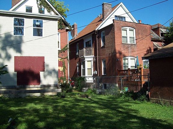 Exterior Rear with View of Neighboring Property