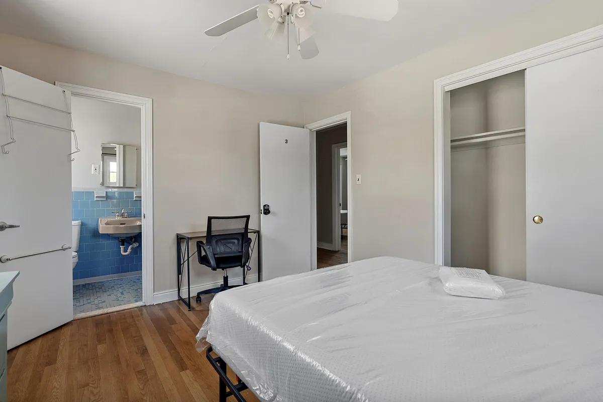 Bed room 3 - with Private bath. large window; includes a dresser, study desk, bed and bedside table. - Three Chopt Rd