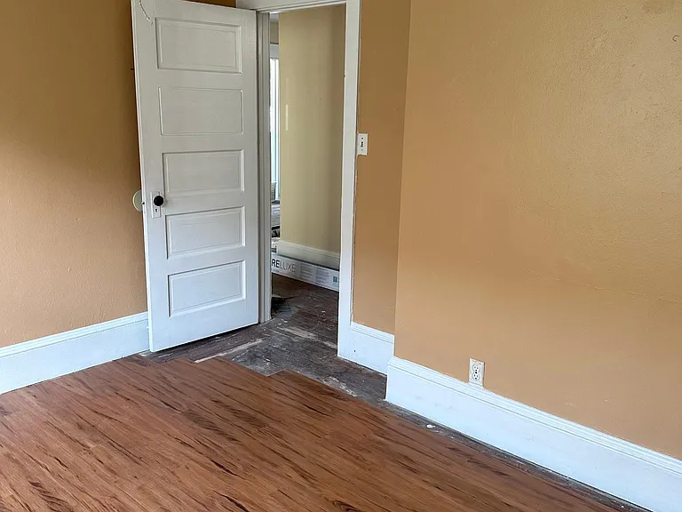 Back bedroom looking into hall