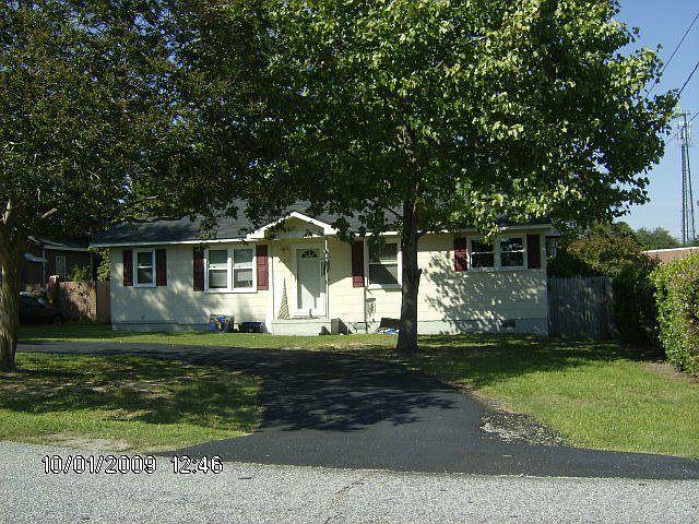 Front with new driveway