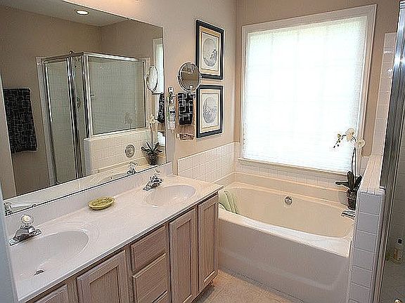 Master Bath Including Soaking Tub and Separate Glass Shower