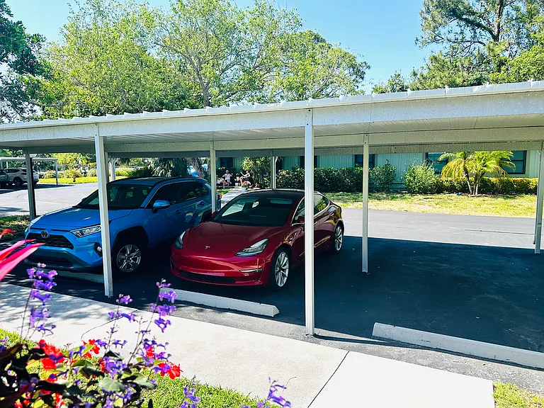 Carport (red car in your space).