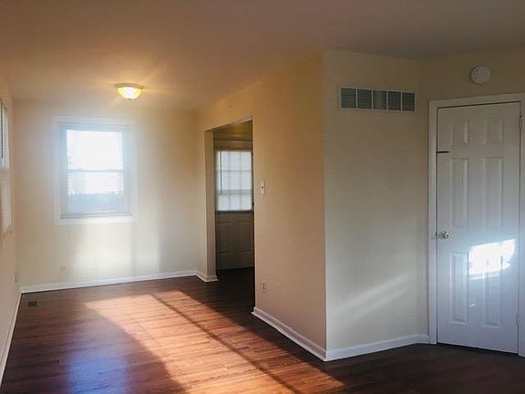 LR/DR COMBO! Lots of windows! Nice and sunny! Dining room is 11 1/2' x 7 1/2'! Door is to the basement.