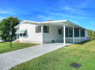 377 Dolphin Cir, Barefoot Bay, FL 32976