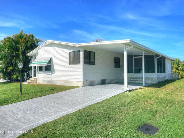 377 Dolphin Cir, Barefoot Bay, FL 32976