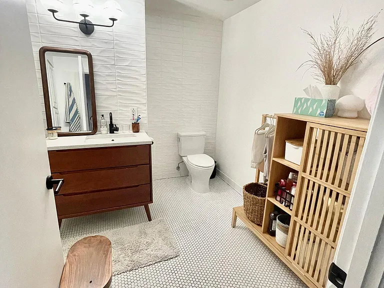 Upgraded bathroom done in 2020. New toilet, sink, and storage added.