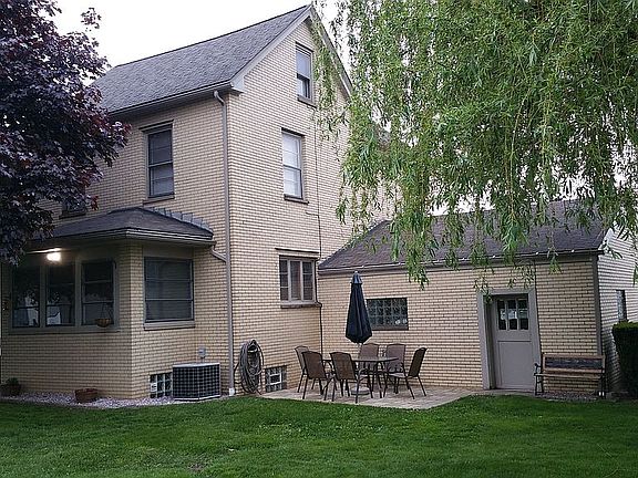 1 of 2 back patio areas