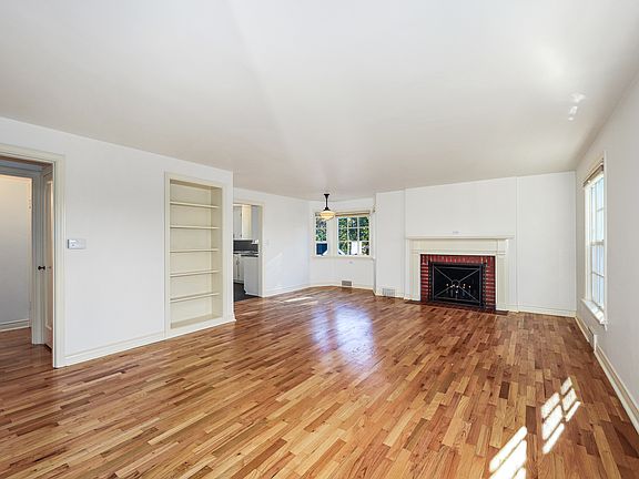 Living room, dining room. Hall with coat and linen closets, leading to 2 upstairs bedrooms. Entire upstairs walls, ceilings and trim just painted.