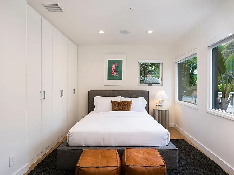 Guest bedroom #4 with a queen size bed, Smart TV and full bathroom.