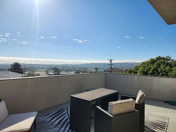 The view from the deck upstairs. You can see the Pacific Ocean, Mission Bay, and Mt. Soledad. You get some nice ocean breezes from here.