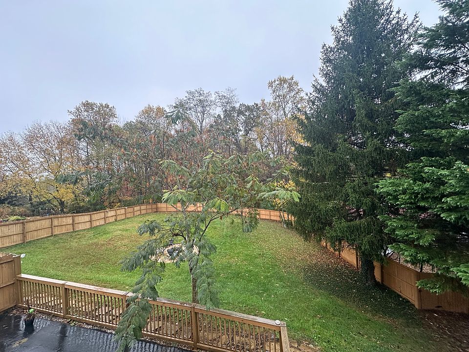 Fully fenced yard, firepit.