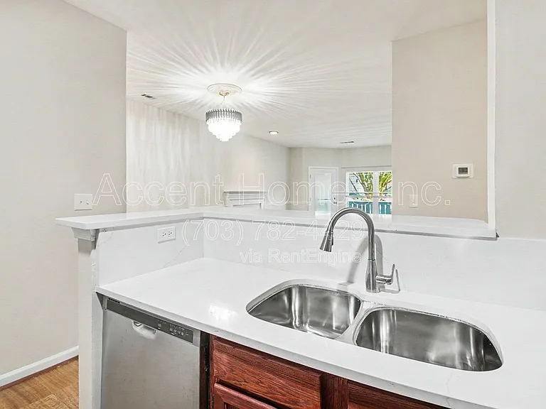 14309 Climbing Rose Way #104 — Photo 7