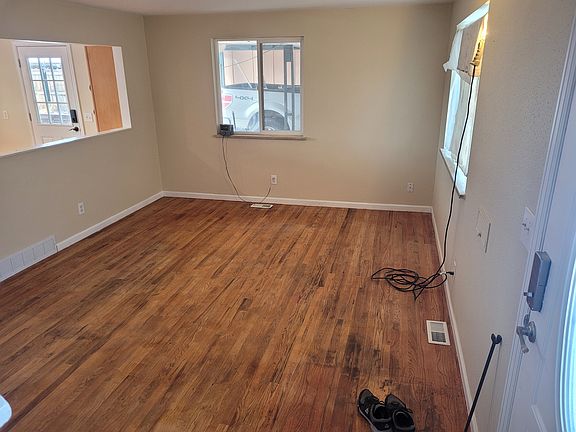 Entry way leads to living room on main level. Kitchen passthru.