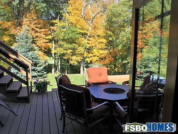 View Out Through Frenchdoors of Lower Deck from Sunken Living Room