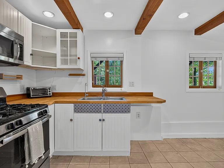 Kitchen looking out to covered patio