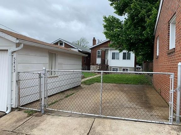 Garage & parking pad, both manual open