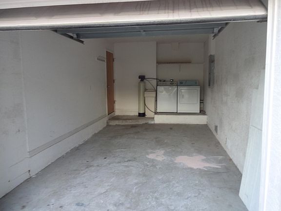 Garage for your car or bike. Also houses washer and dryer h
