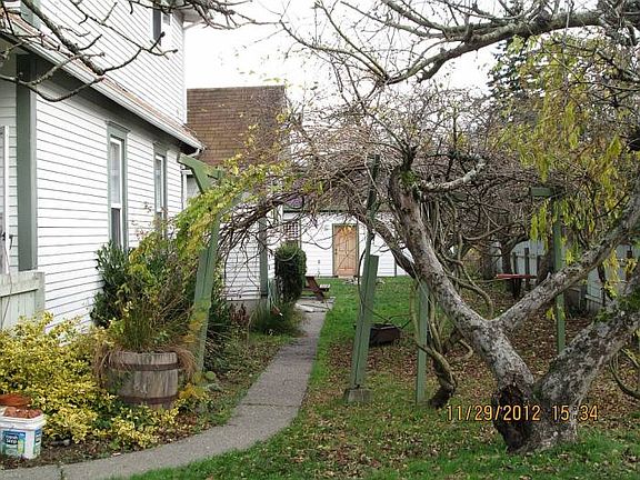 Greenhouse & shop in back