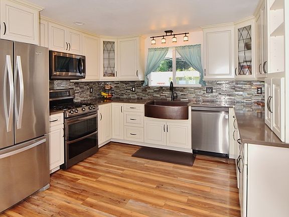 New amazing Kitchen with customized Cabinets, Mixer stand, spice rack and more. You have to see this to understand how nice it is