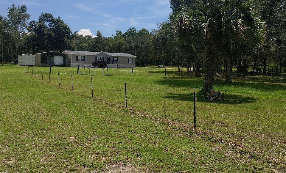 4.9 acres cross fenced